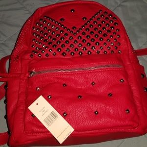 Red studded backpack